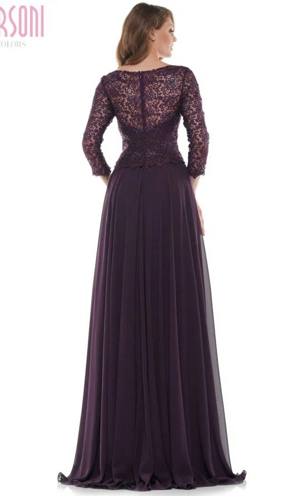 A woman is seen from the back wearing the Marsoni M223 long formal dress, featuring dark purple fabric, a lace-embroidered bodice, and semi-sheer sleeves.